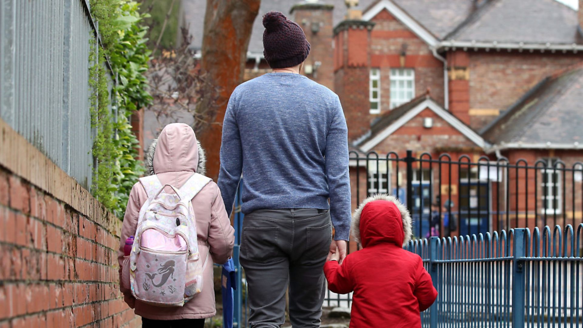 Children make their way to school after it has been announced that schools will be closing due to the coronavirus. Photograph: Nick Potts/PA Wire. - Credit: PA