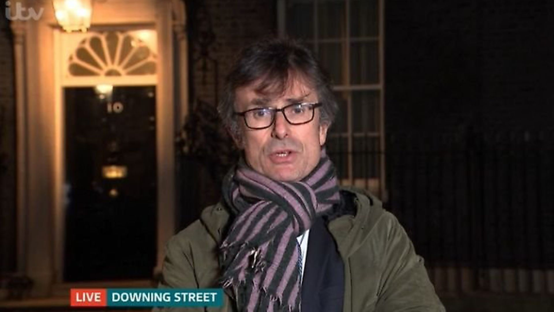 Robert Peston reports outside Downing Street on the ITV News. Photograph: ITV. - Credit: Archant