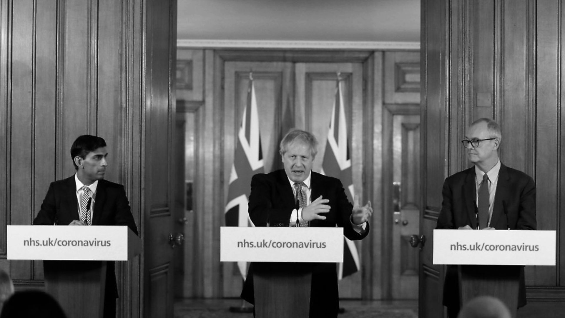 Chief scientific adviser Patrick Vallance sits alongside chancellor Rishi Sunak and prime minister Boris Johnson at a news conference. (Photo by Matt Dunham / POOL / AFP via Getty Images). - Credit: POOL/AFP via Getty Images