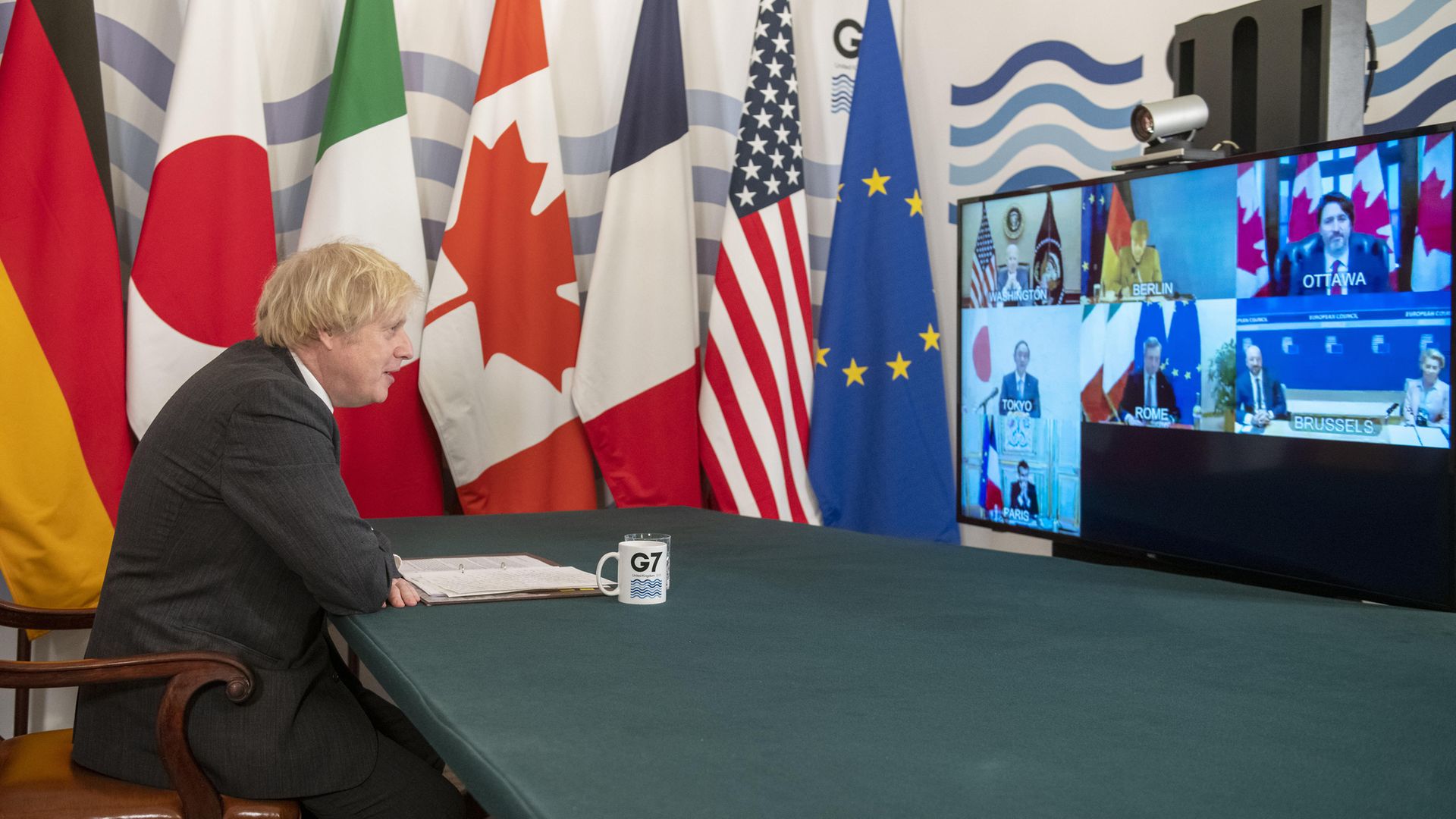 Prime minister Boris Johnson in the Cabinet Room, Downing Street, London, hosting the G7 leaders for a virtual meeting to discuss worldwide distribution of coronavirus vaccines and preventing future pandemics - Credit: PA