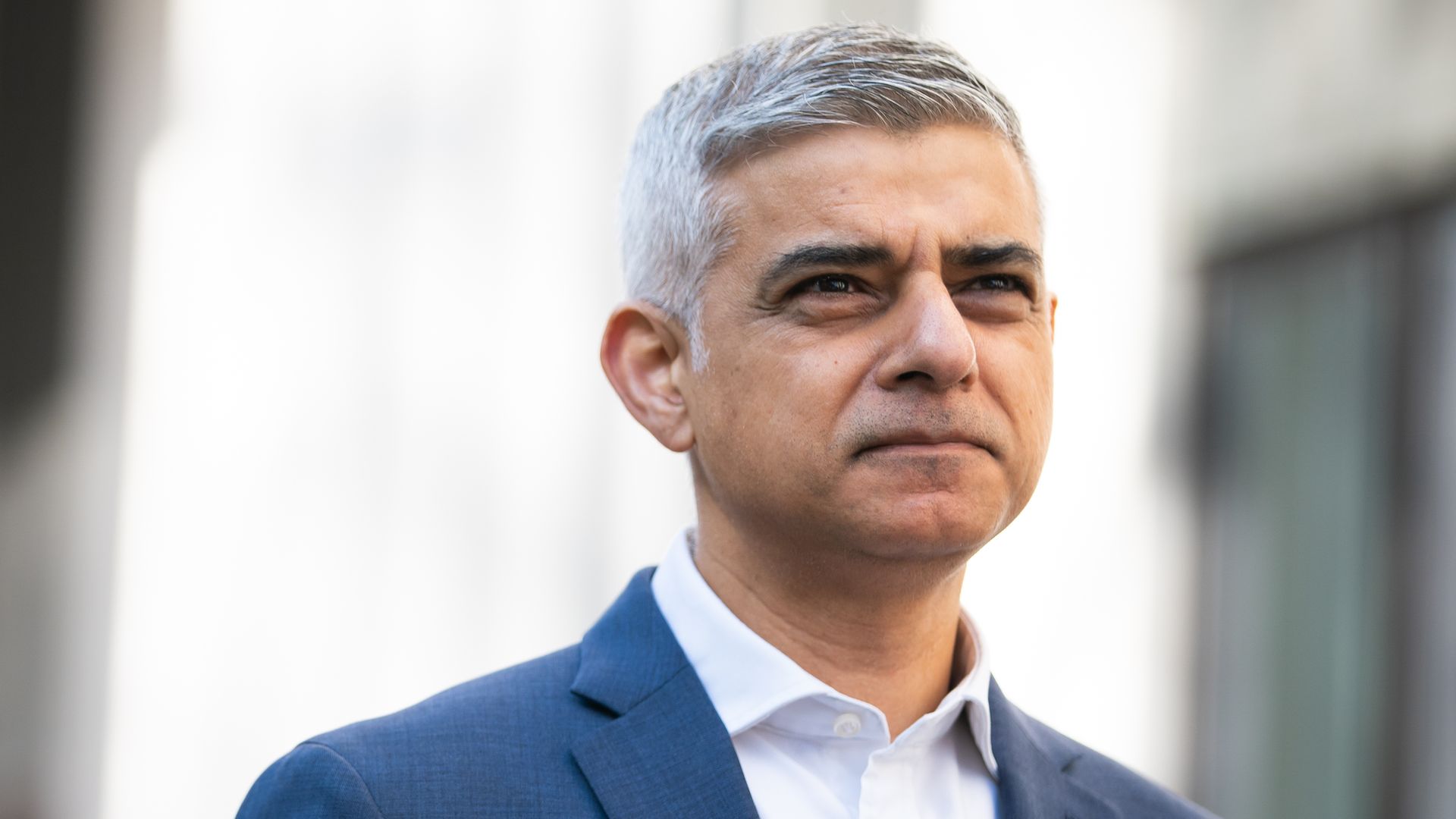 Sadiq Khan at Savoy Place, London, unveiling his pledge for four new skills academies, to help Londoners retrain and find new jobs, and the launch of his 'jobs, jobs, jobs' billboard during campaigning for the London Mayoral election - Credit: PA