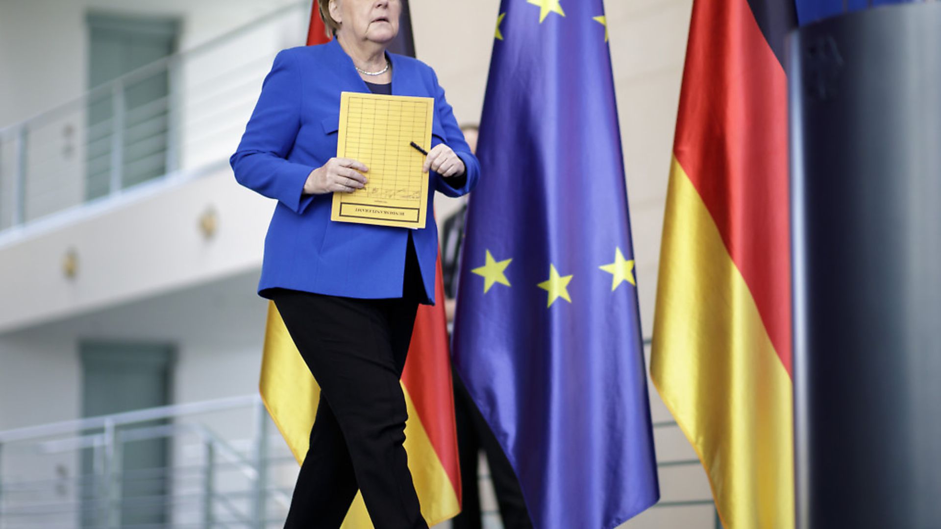 Germany's chancellor Angela Merkel, CDU, gives a statement and press conference after a meeting of the Corona cabinet. Photo: Thomas Imo/Photothek via Getty Images - Credit: Photothek via Getty Images