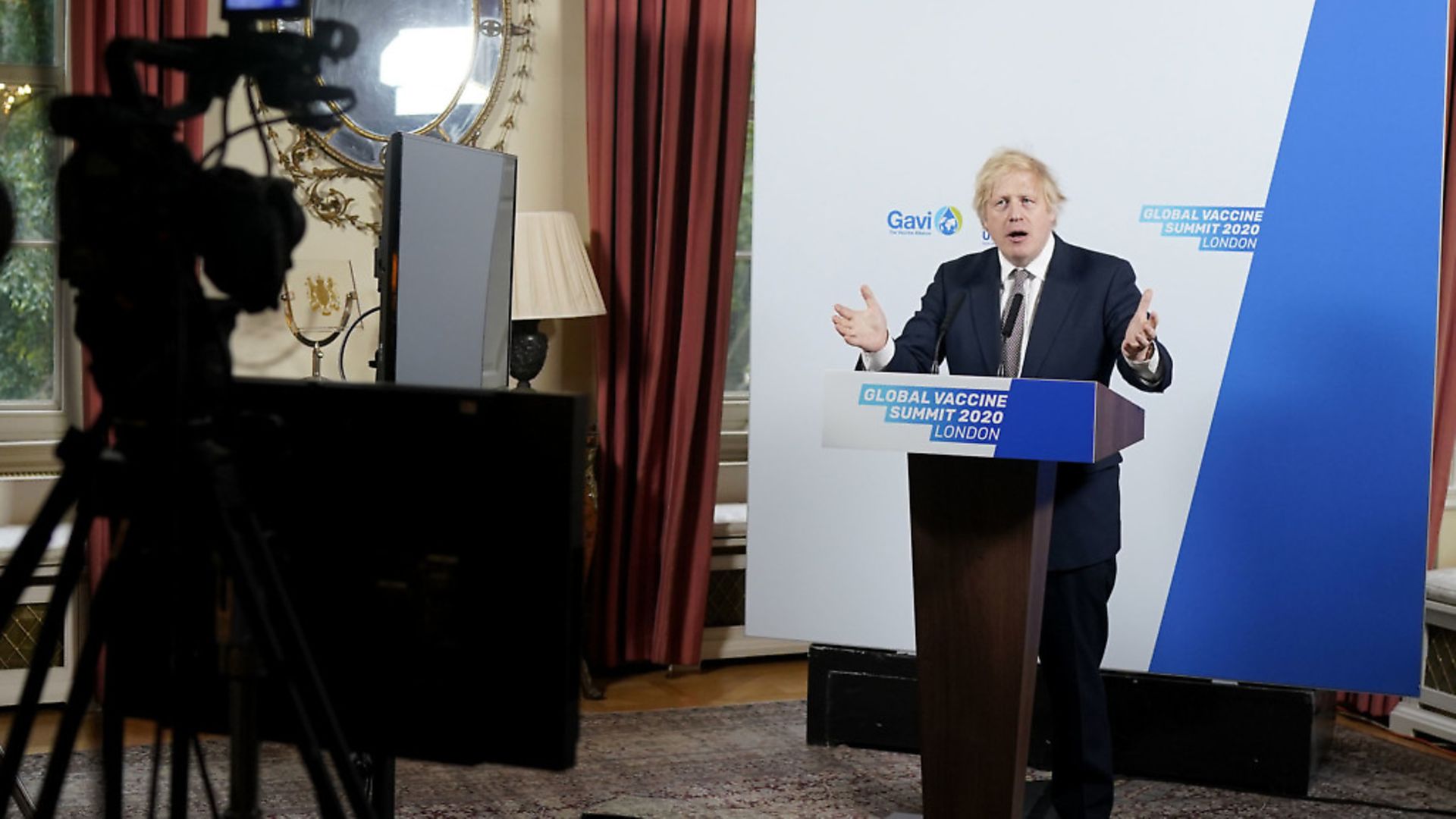 Prime Minister Boris Johnson delivering a speech to the Global Vaccine Summit from the White Room of No10 Downing Street. Photograph: Andrew Parsons/10 Downing Street/Crown Copyright/PA Wire. - Credit: PA