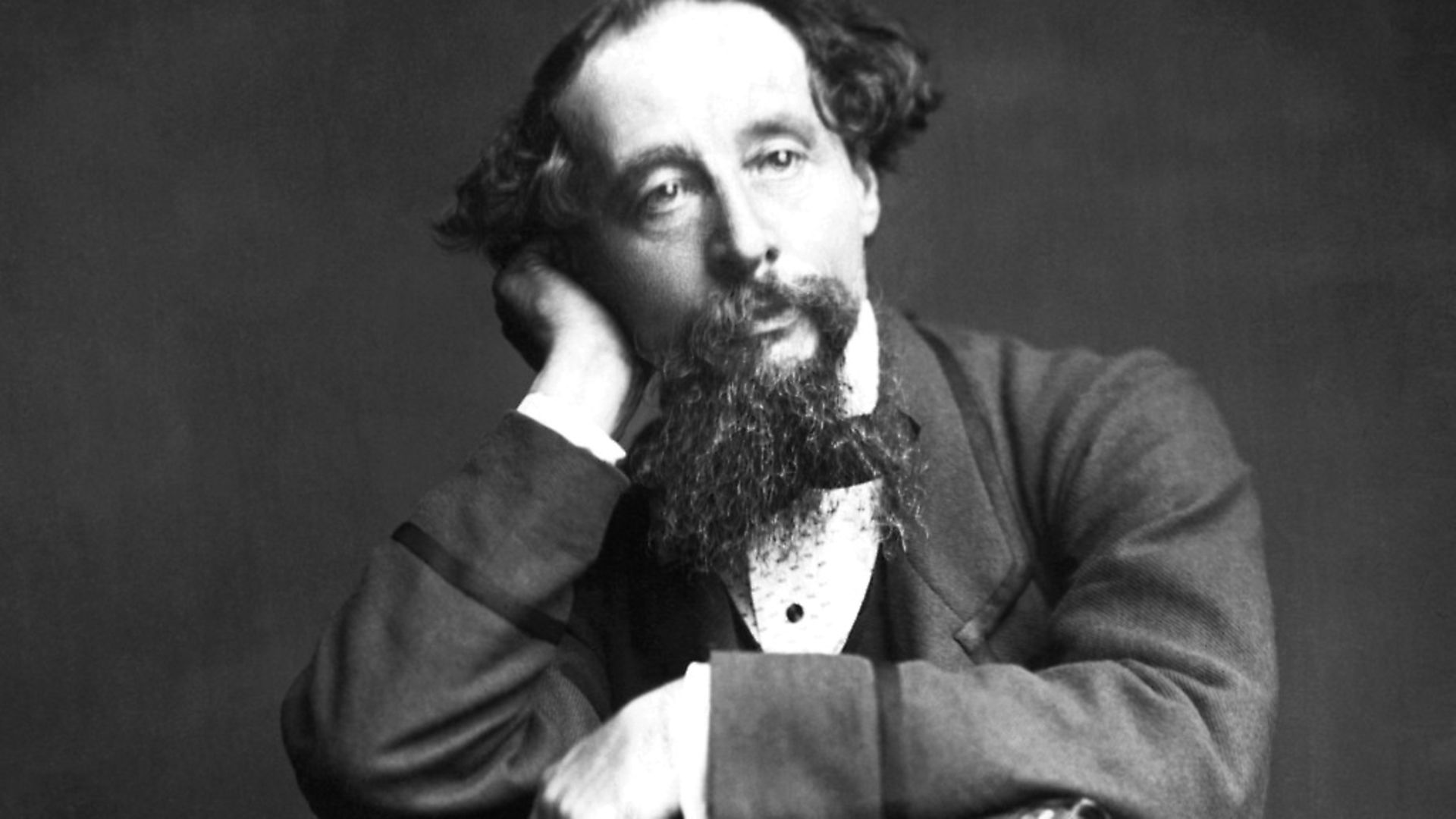 (Original Caption) Photograph of Charles Dickens (1812-1870) seated. Photo: Bettmann Archive - Credit: Bettmann Archive