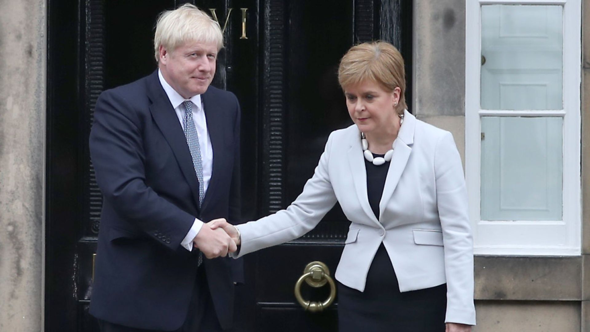 Scotland's first minister Nicola Sturgeon with prime minister prime minister Boris Johnson outside Bute House in Edinburgh. Photograph: Jane Barlow/PA. - Credit: PA