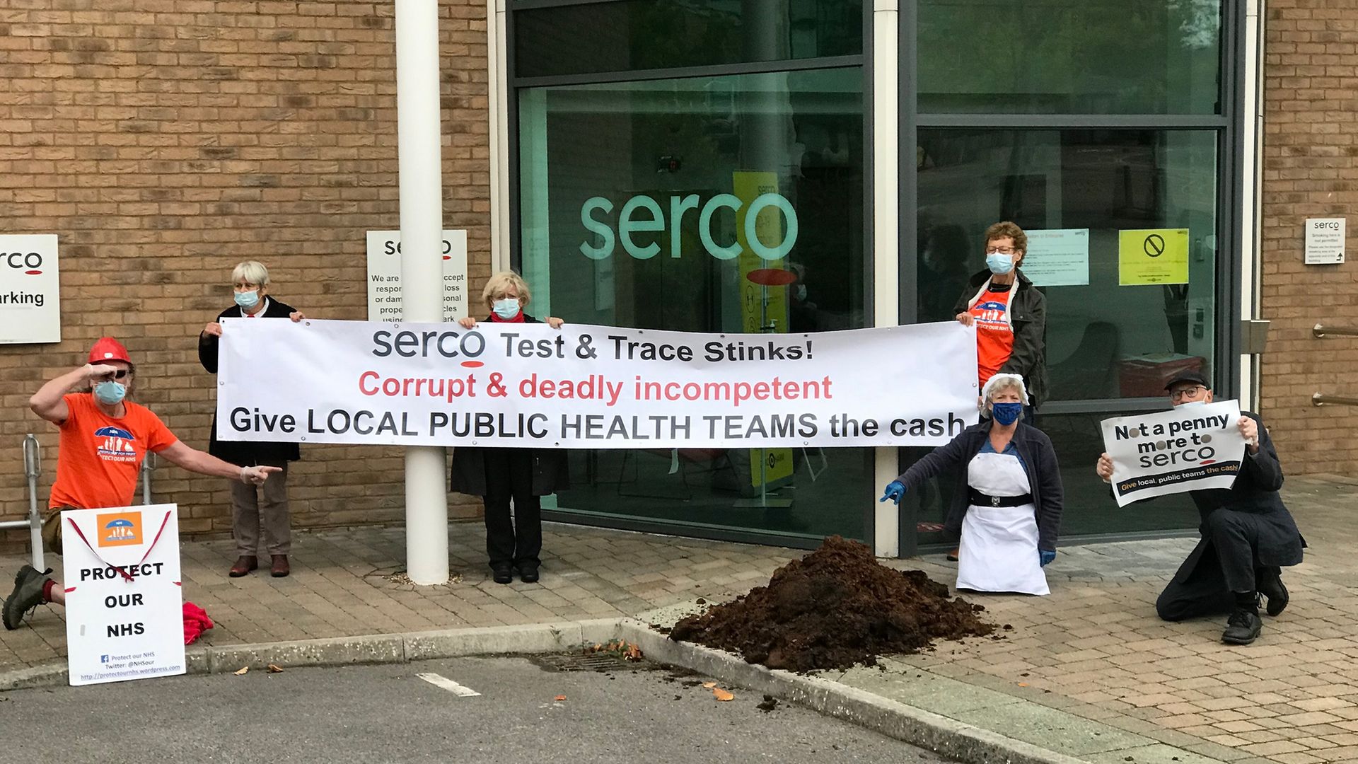 We Own It campaigners outside Serco's offices - Credit: Twitter/We Own It