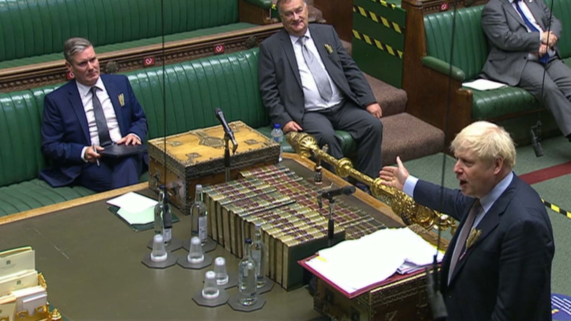 Prime Minister Boris Johnson points to Labour leader Keir Starmer - Credit: PA