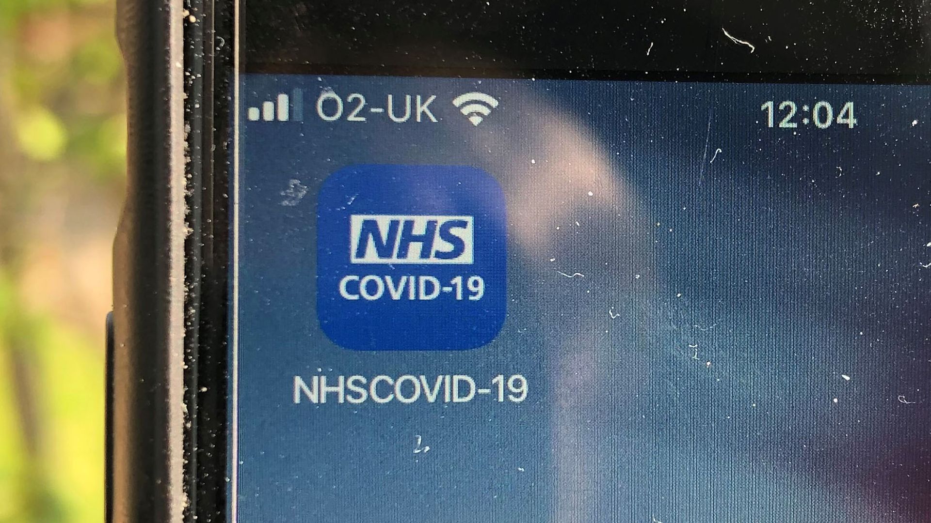 The NHS Covid-19 app on a mobile phone - Credit: PA