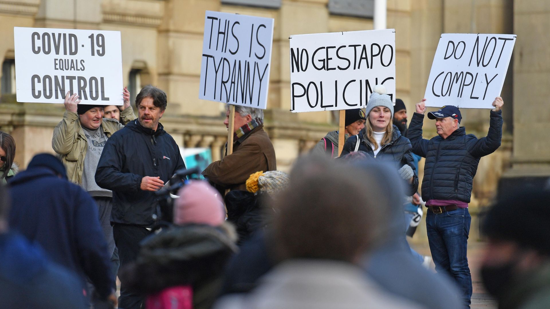 People take part in a demonstration in Victoria Square, Birmingham, to protest against coronavirus lockdown restrictions. - Credit: PA