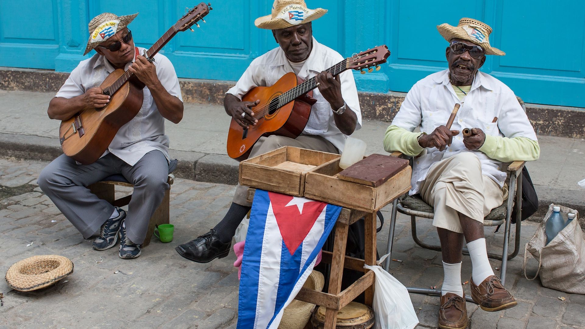 Musicians perform on the street in Old Havana - Credit: Getty Images