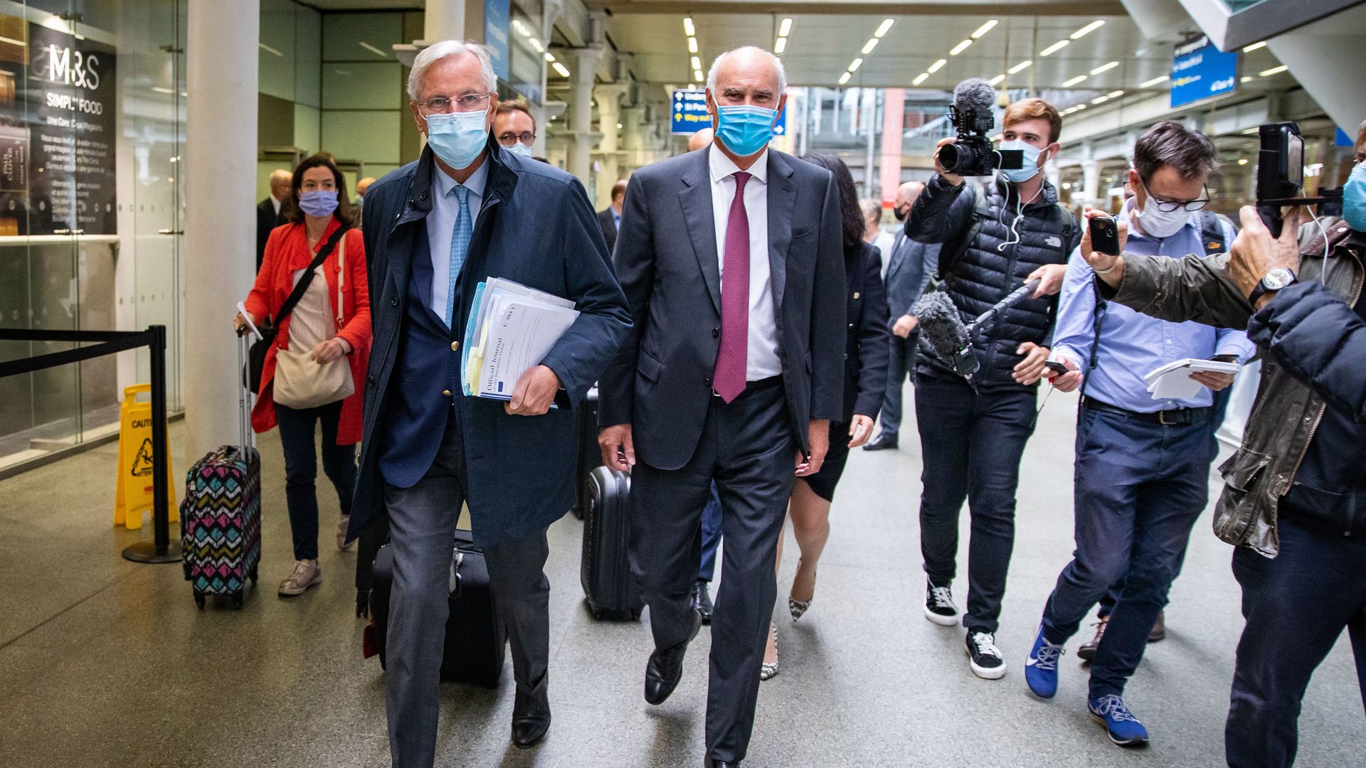 Ex-EU chief Brexit negotiator Michel Barnier (left) arriving from the Eurostar with then EU Ambassador to the UK, Portuguese diplomat Joao Vale de Almeida at St Pancras International railway station, London - Credit: PA