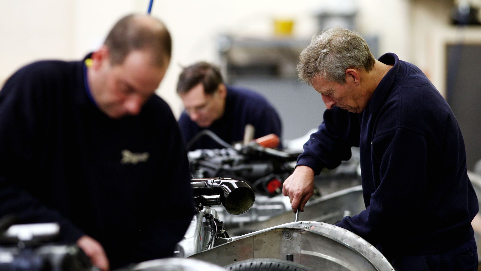 Workers in a factory as the UK faces a difficult period of trading following Brexit and the coronavirus pandemic - Credit: PA