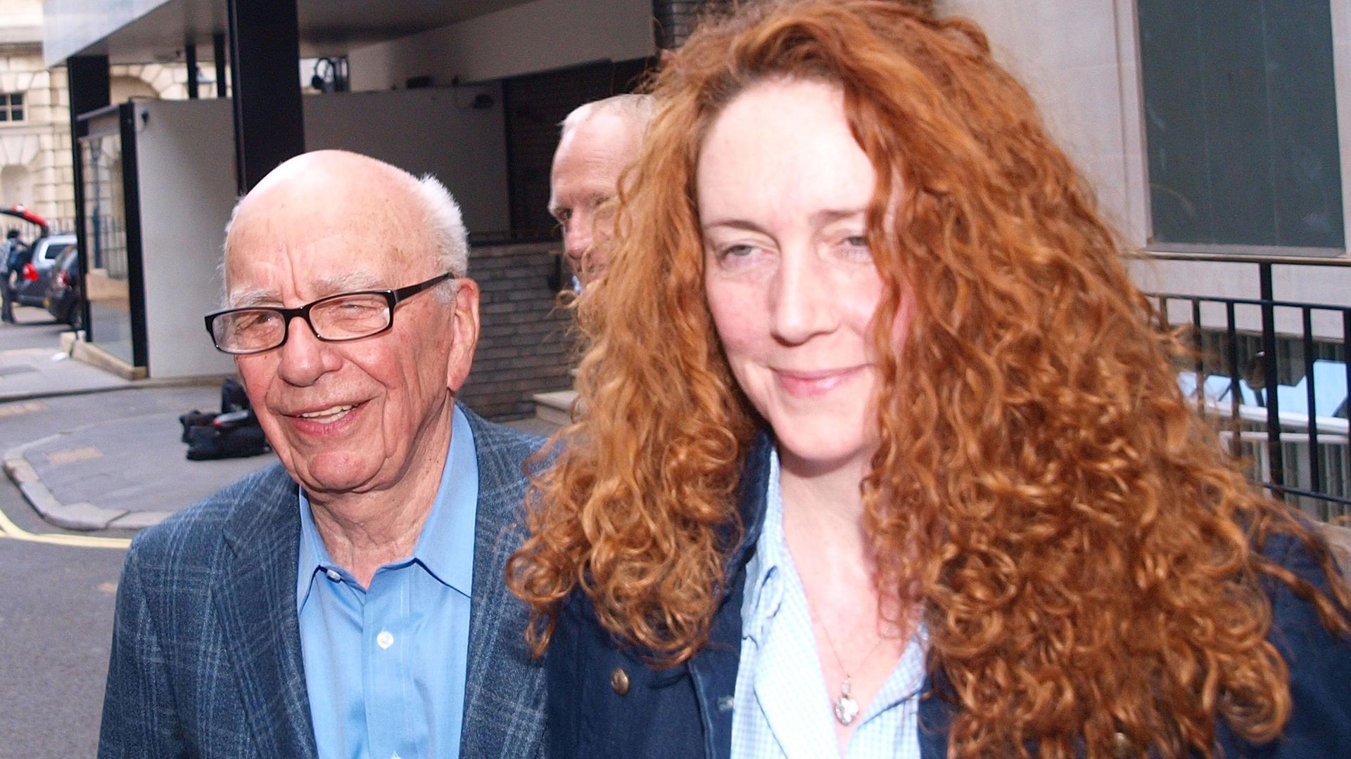 News International chief executive Rebekah Brooks and Rupert Murdoch are seen outside Murdoch's London flat. - Credit: PA