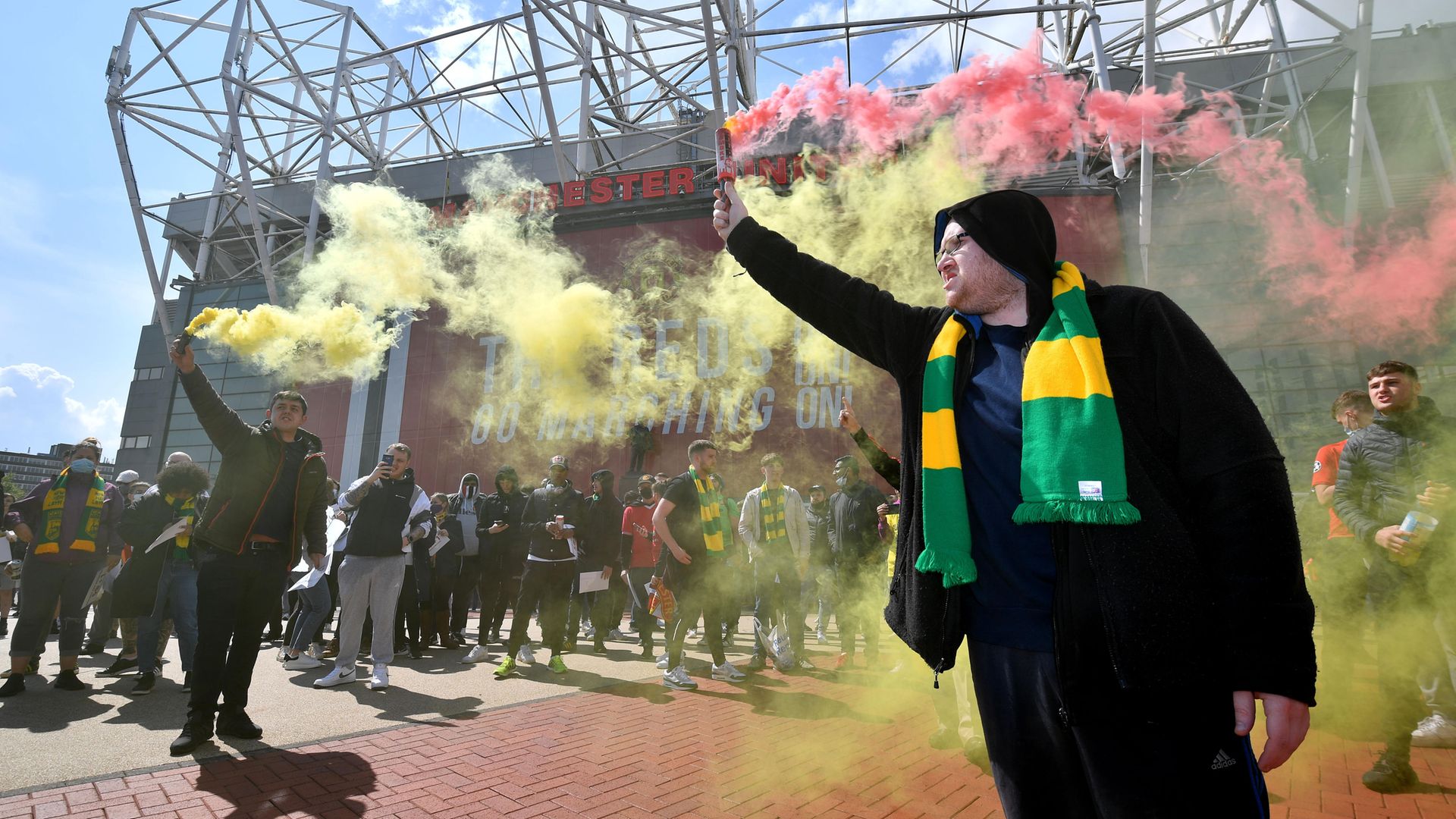 Manchester United fans protest but those who believe the German 50+1 system will bring equality (right) are misguided - Credit: Offside via Getty Images