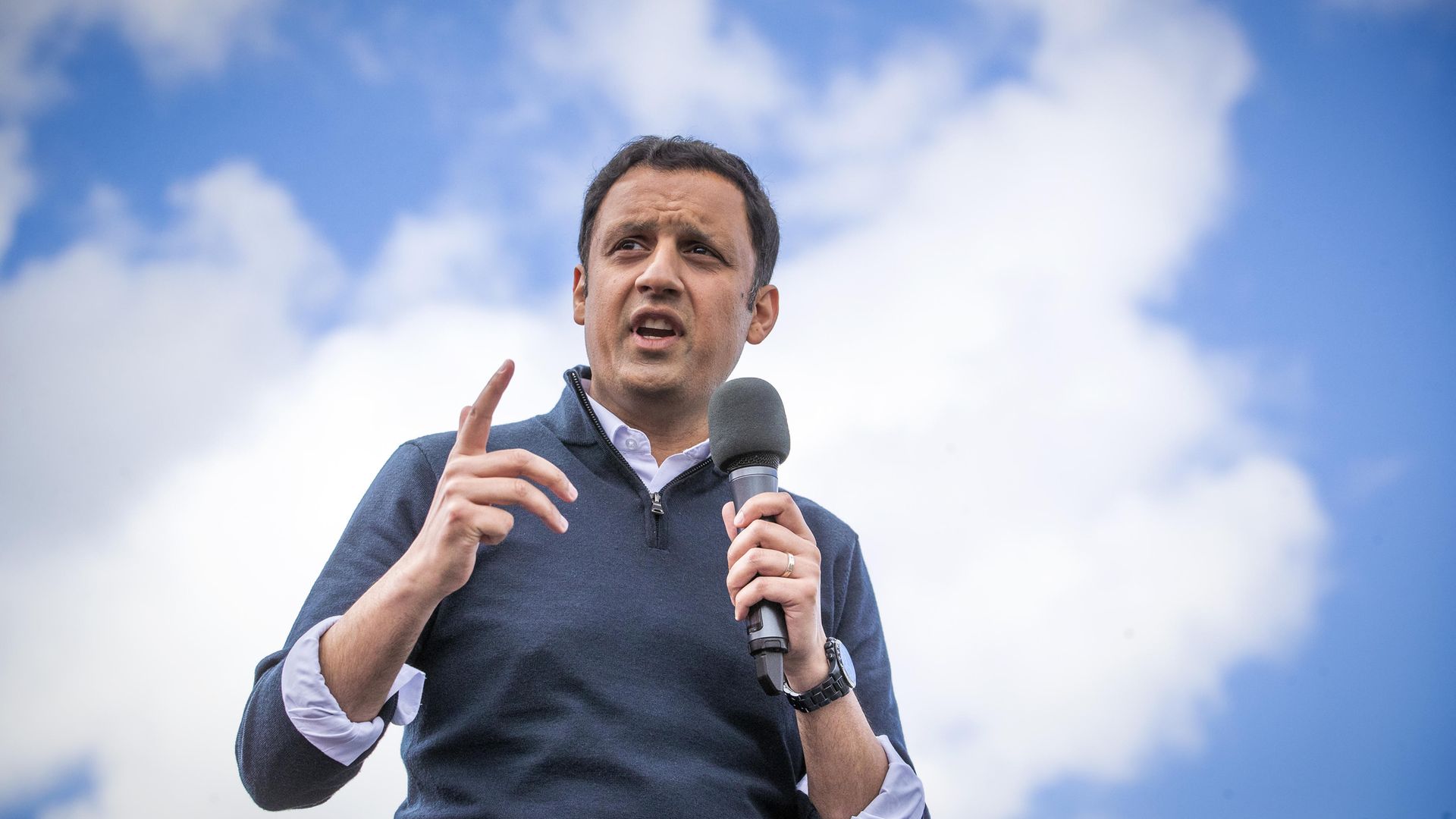 Scottish Labour leader Anas Sarwar on stage at a drive-in rally in Glasgow during campaigning for the Scottish parliamentary election - Credit: PA