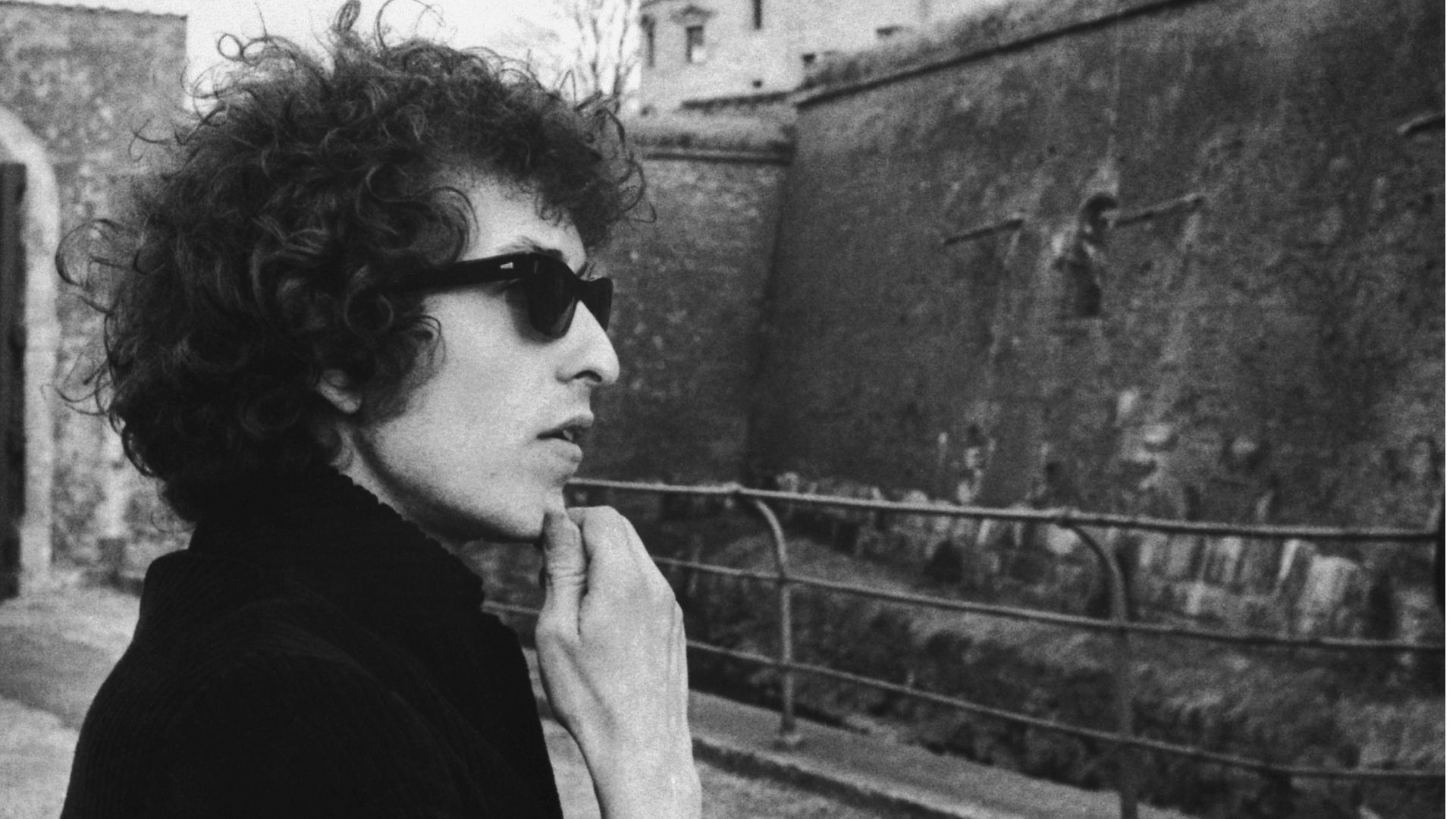 Bob Dylan contemplates Kronborg Castle, the Elsinore Castle of Shakespeare's Hamlet, shortly after arriving in Denmark to start his 1966 world tour. - Credit: Bettmann Archive/Getty Images