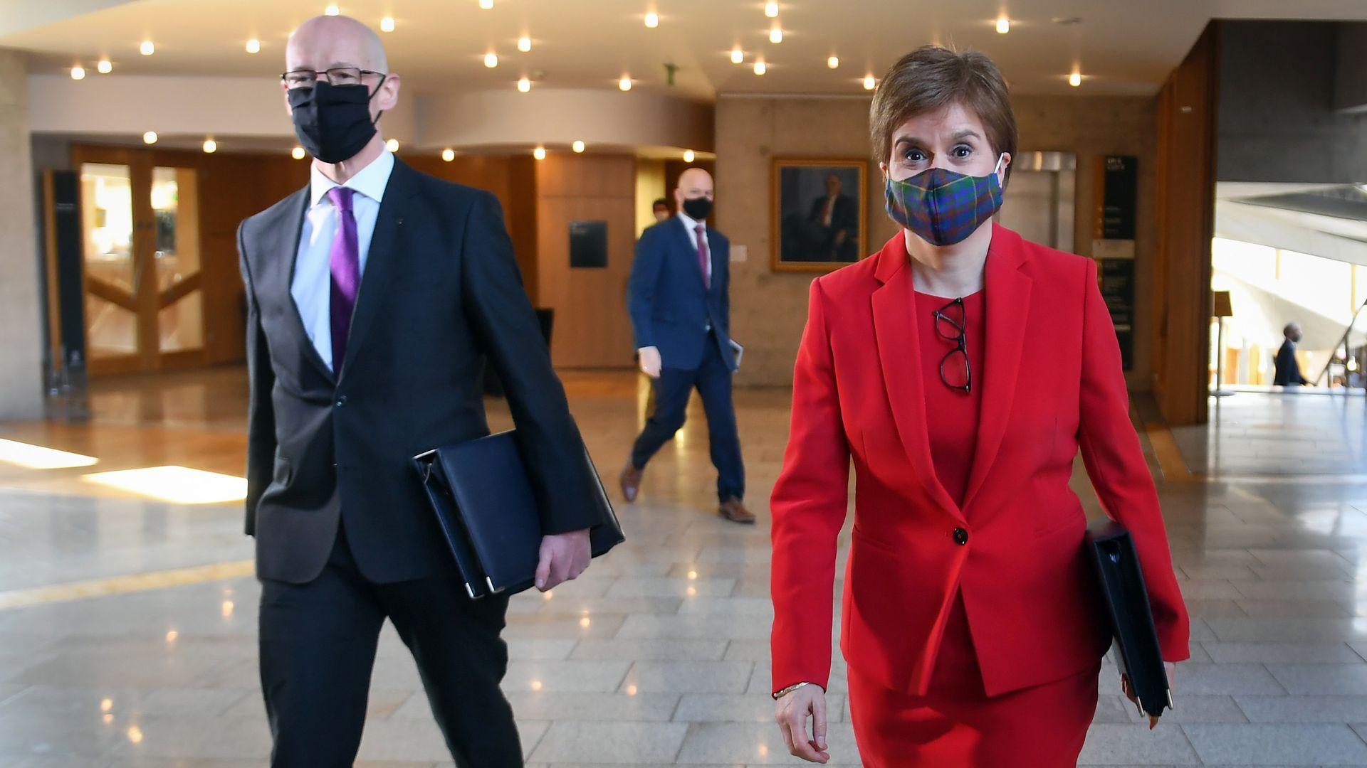 Scotland's deputy first minister, John Swinney, (L) arriving for First Minister's Questions at the Scottish parliament in Holyrood with first minister Nicola Sturgeon. Swinney declared the SNP was on course to win a 'historic' fourth term in government - Credit: PA