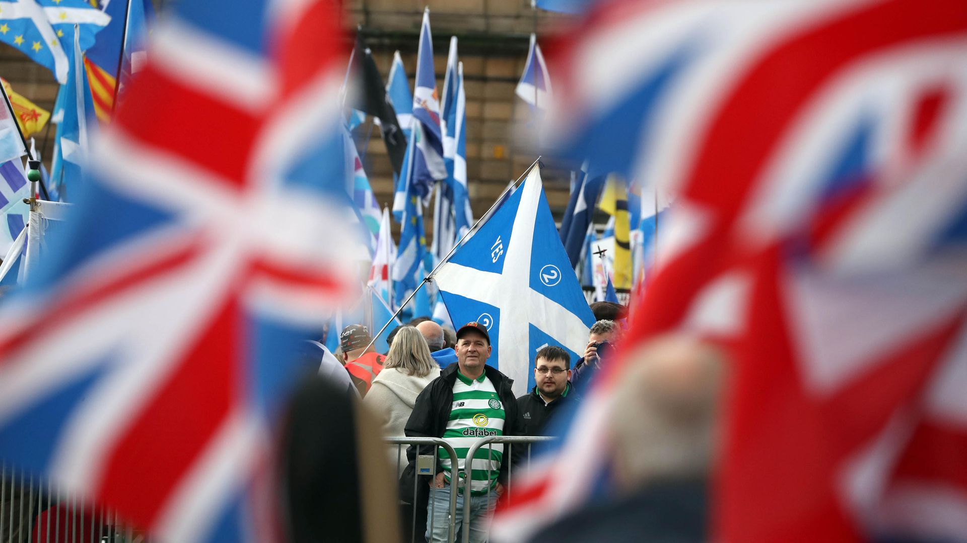 Independence and Union supporters in George Square in Glasgow - Credit: PA