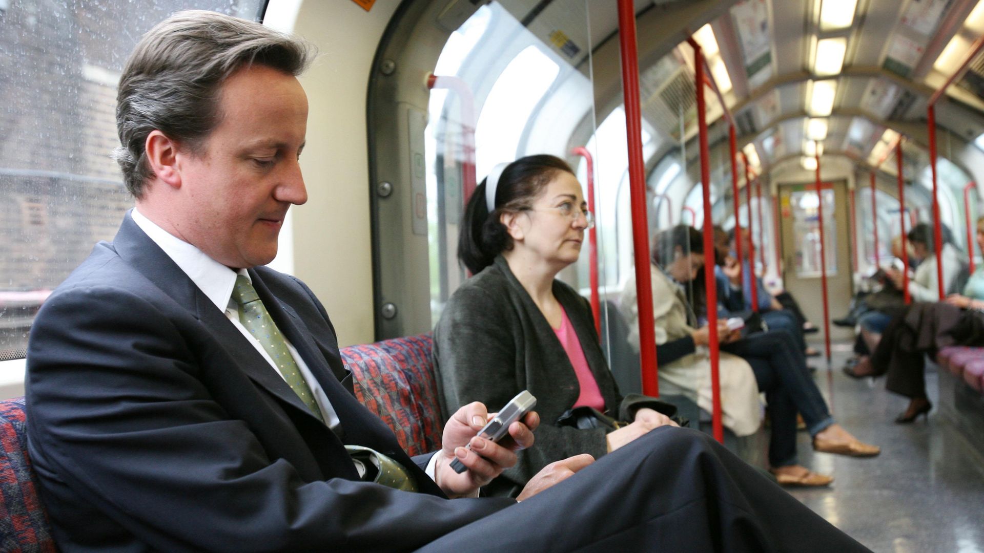 David Cameron on the tube back to central London from Epping - Credit: PA