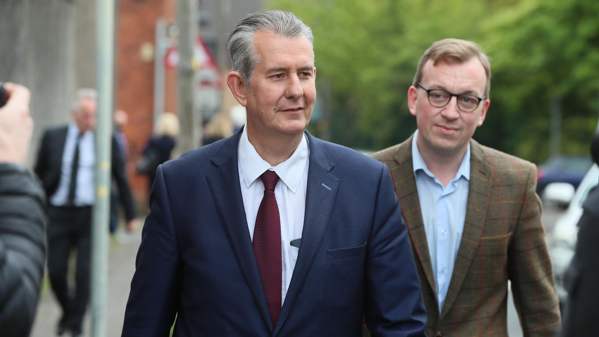 Edwin Poots (right) the Northern Ireland Minister of Agriculture, Environment, and Rural Affairs (DAERA) is followed by DUP MLA Christopher Stalford after leaving the Democratic Unionist Party (DUP) headquarters in Belfast following voting in the party's leadership election - Credit: PA