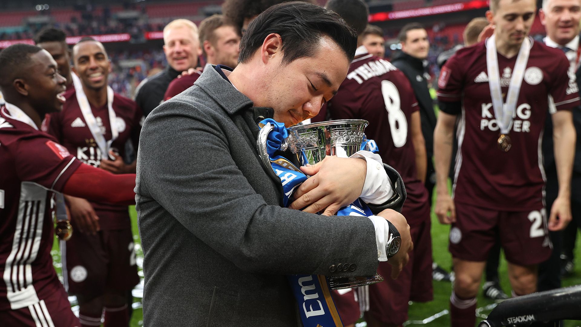 Aiyawatt Srivaddhanaprabha, aka Khun Top, chairman of Leicester City celebrates with the Emirates FA Cup trophy on May 15, 2021 - Credit: Photo by Eddie Keogh - The FA/The FA via Getty Images