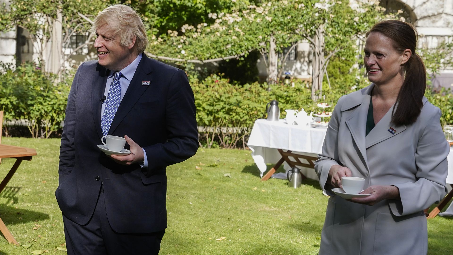 Jenny McGee (right) at a Downing Street garden party with Prime Minister Boris Johnson (left) who she looked after while he was in hospital suffering from Covid-19 - Credit: PA