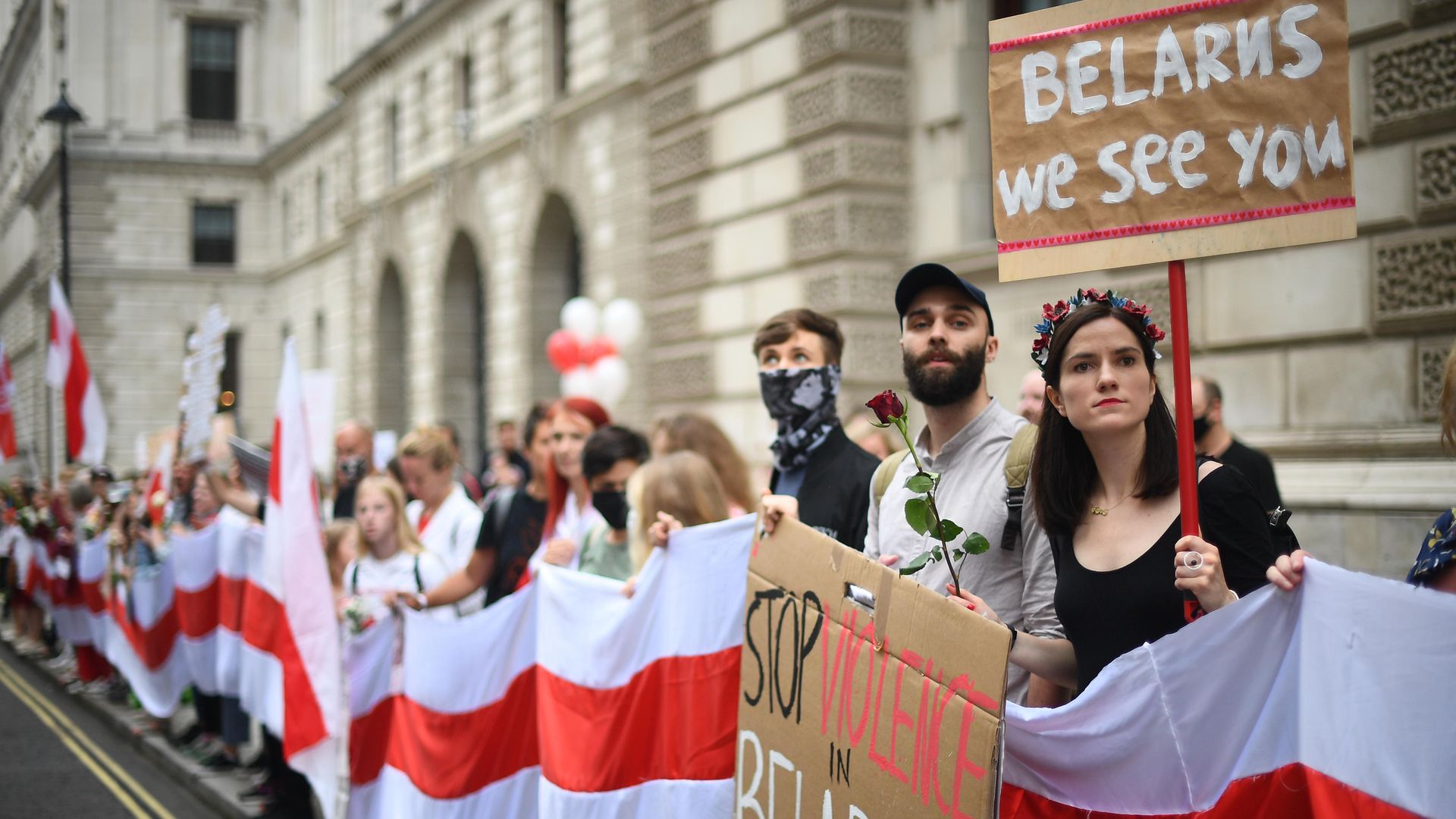 A demonstration outside the Foreign & Commonwealth Office in central London calling for authoritarian President Alexander Lukashenko to resign - Credit: PA