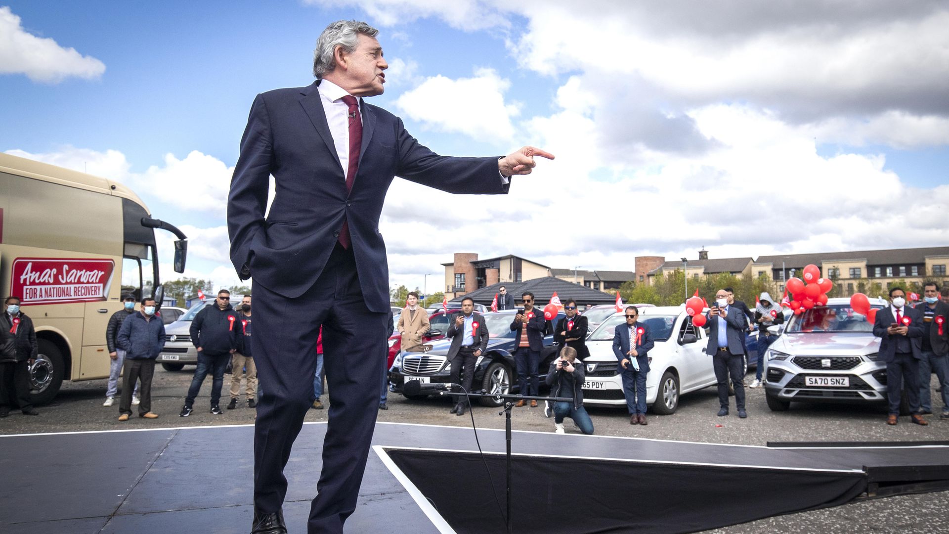 Former prime minister Gordon Brown speaks at a Scottish Labour drive-in rally in Glasgow during campaigning for the Scottish Parliamentary election - Credit: PA