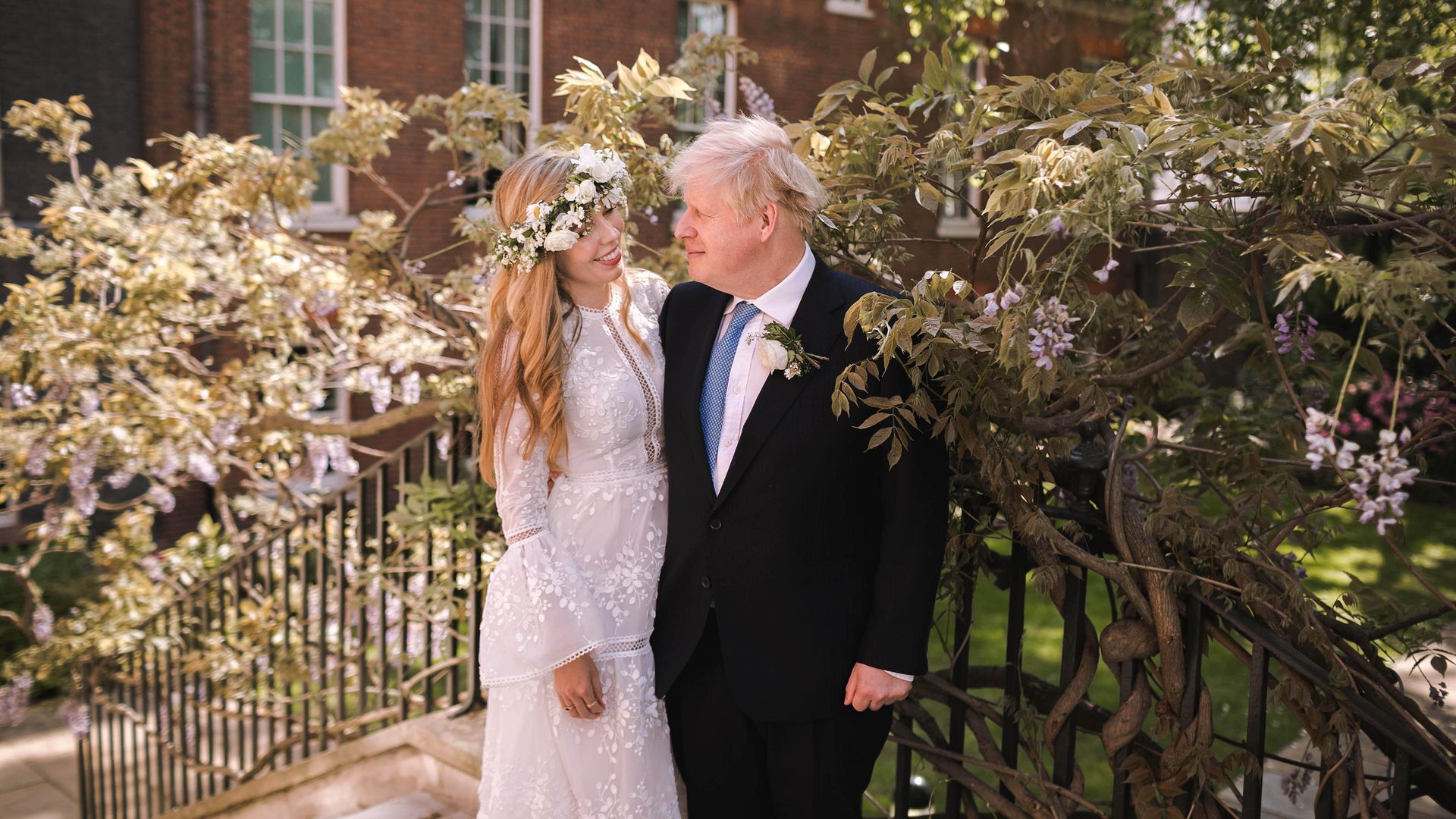 Boris Johnson poses with his wife Carrie in the garden of 10 Downing Street following their wedding at Westminster Cathedral, May 29, 2021 - Credit: Photo by Rebecca Fulton / Downing Street via Getty Images