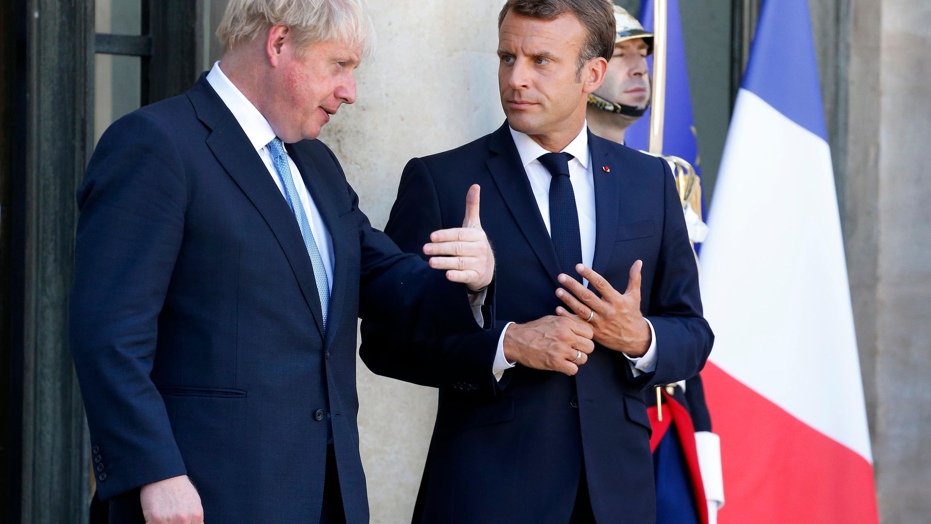 French president Emmanuel Macron accompanies British prime minister Boris Johnson at the Elysee Presidential Palace on August 22, 2019 in Paris - Credit: Photo by Chesnot/Getty Images