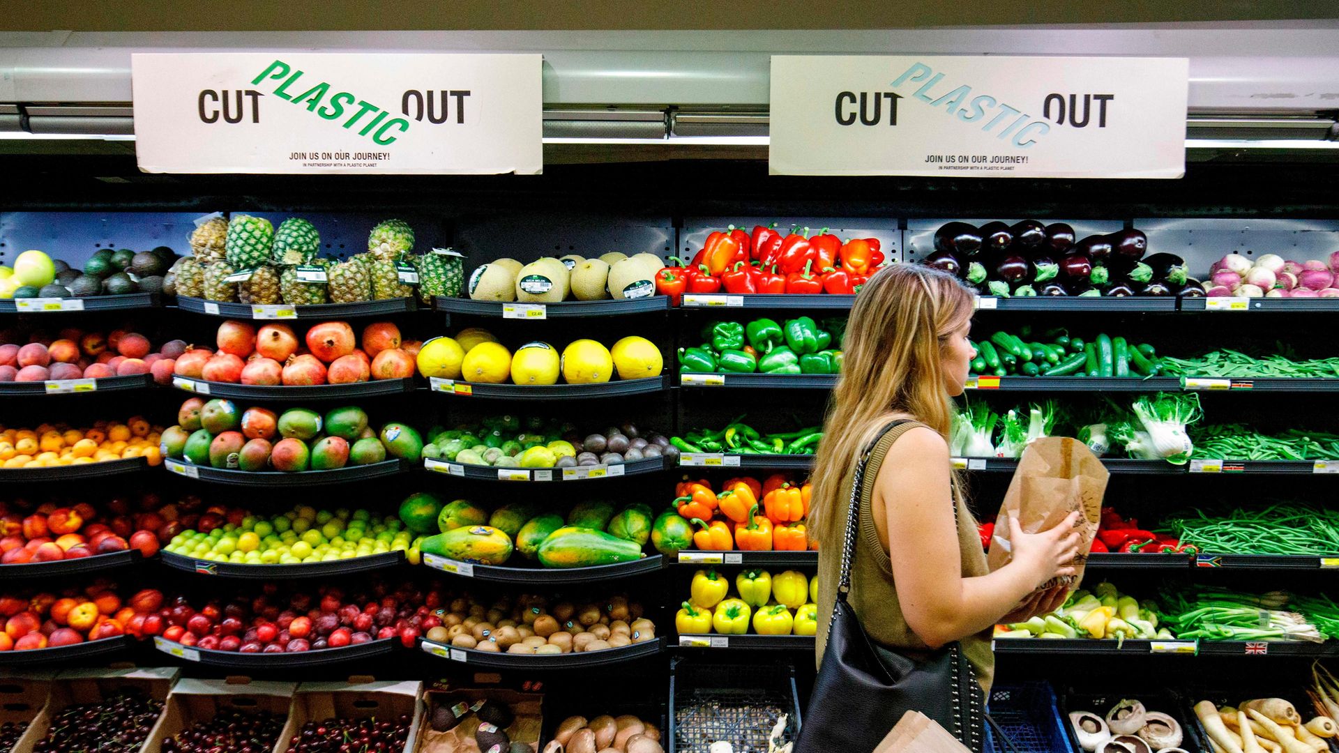 A shopper browsing in a Belsize Park supermarket, north London - Credit: AFP via Getty Images