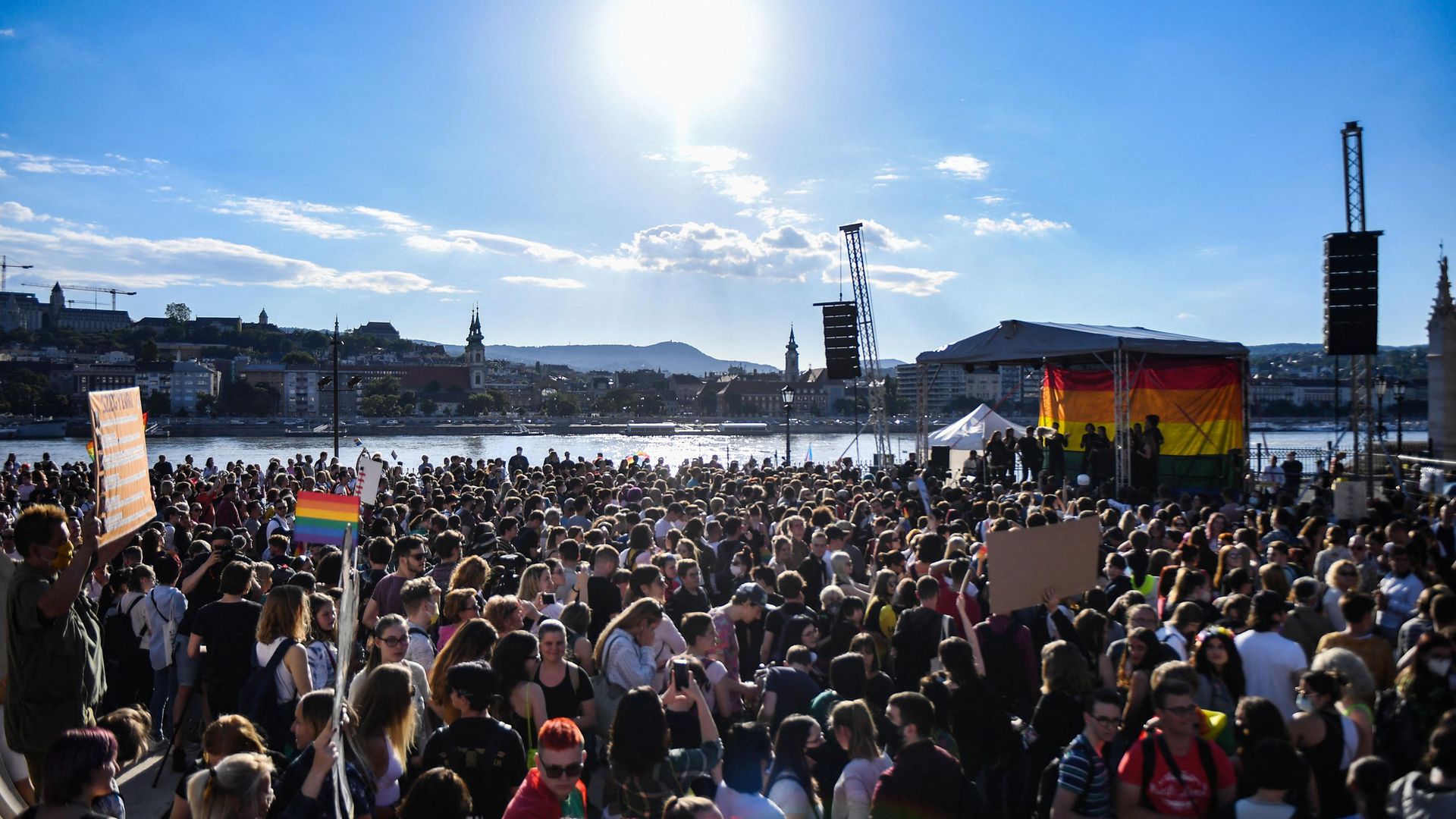 Protestors gather near the Budapest parliament building on June 14, 2021, to demonstrate against the Hungarian government's bill seeking to ban the "promotion" of homosexuality - Credit: AFP via Getty Images