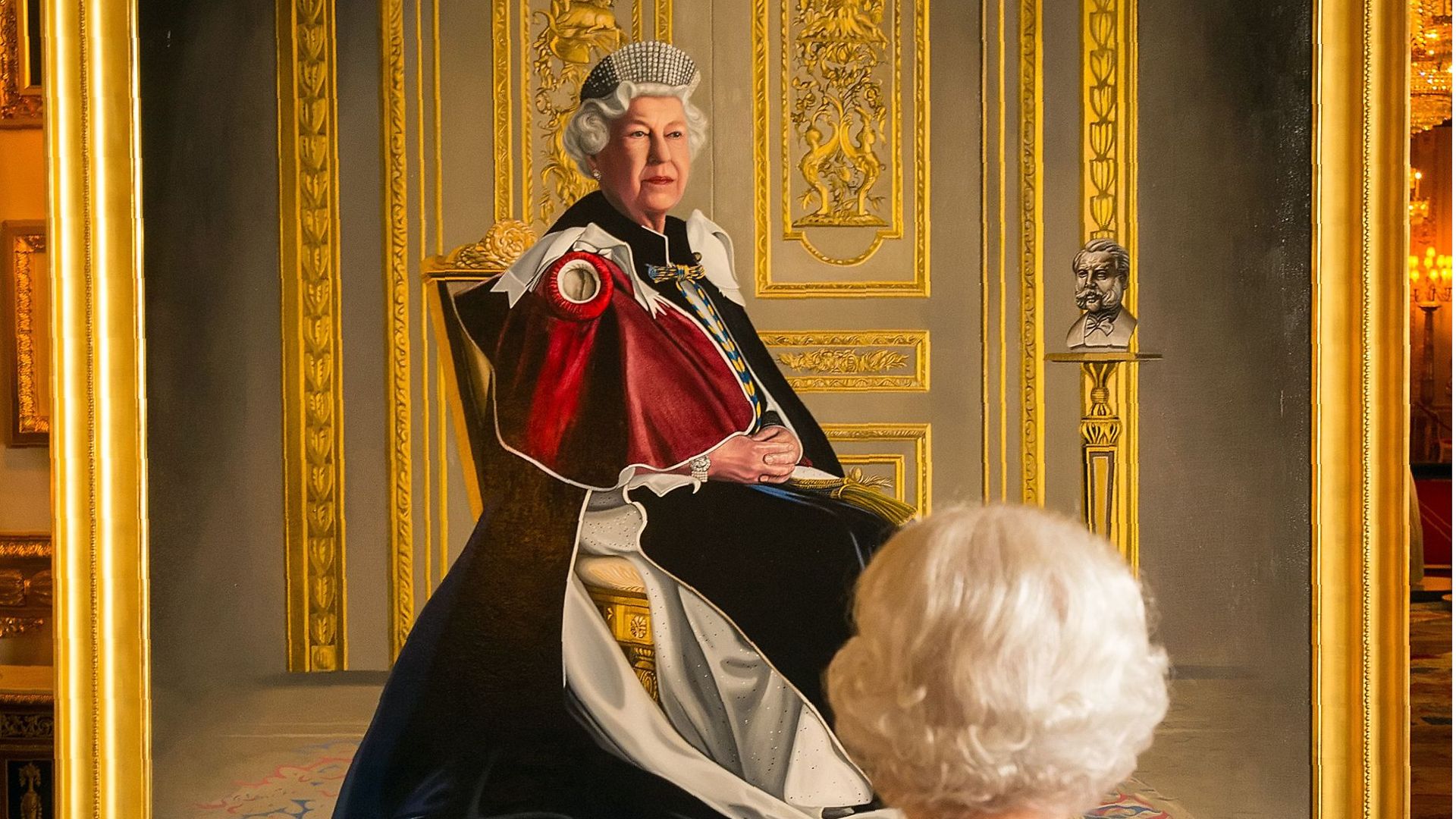 Queen Elizabeth II views a painting of herself by British artist Henry Ward at Windsor Castle, 2016 - Credit: Photo by DOMINIC LIPINSKI/POOL/AFP via Getty Images