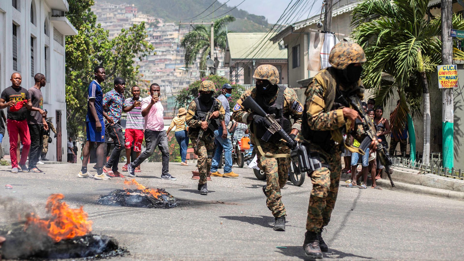 Unrest flares near the police station in Petion Ville after the murder of Haitian president Jovenel Moise in the neighbourhood - Credit: Getty Images