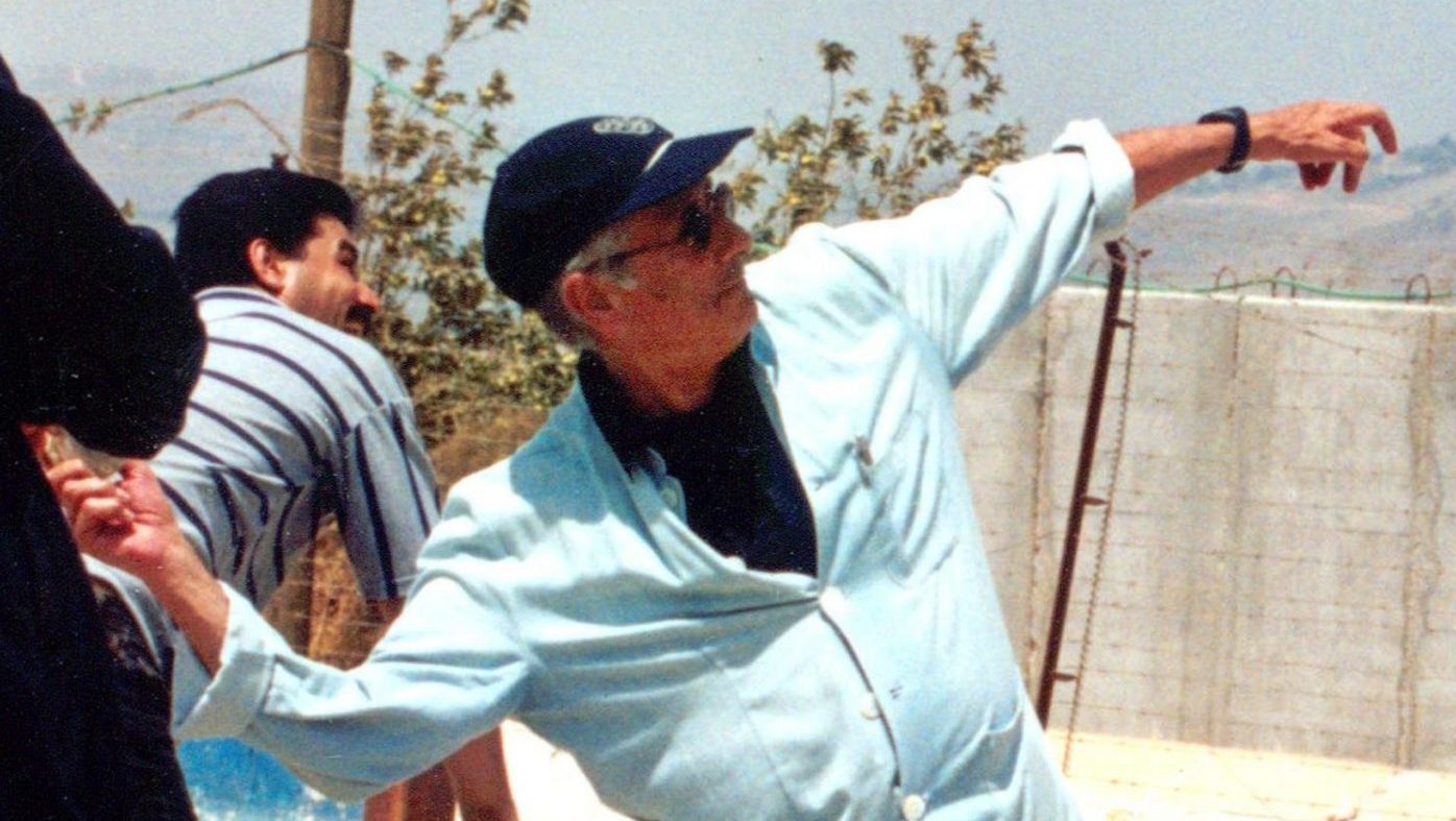 Said throws a stone across Lebanon’s border with Israel in the southern village of Kafr Kila, July 2000. The academic claimed his act was a symbolic expression of joy after Israeli withdrawal from southern Lebanon  and that the nearest Israeli soldier was half a mile away