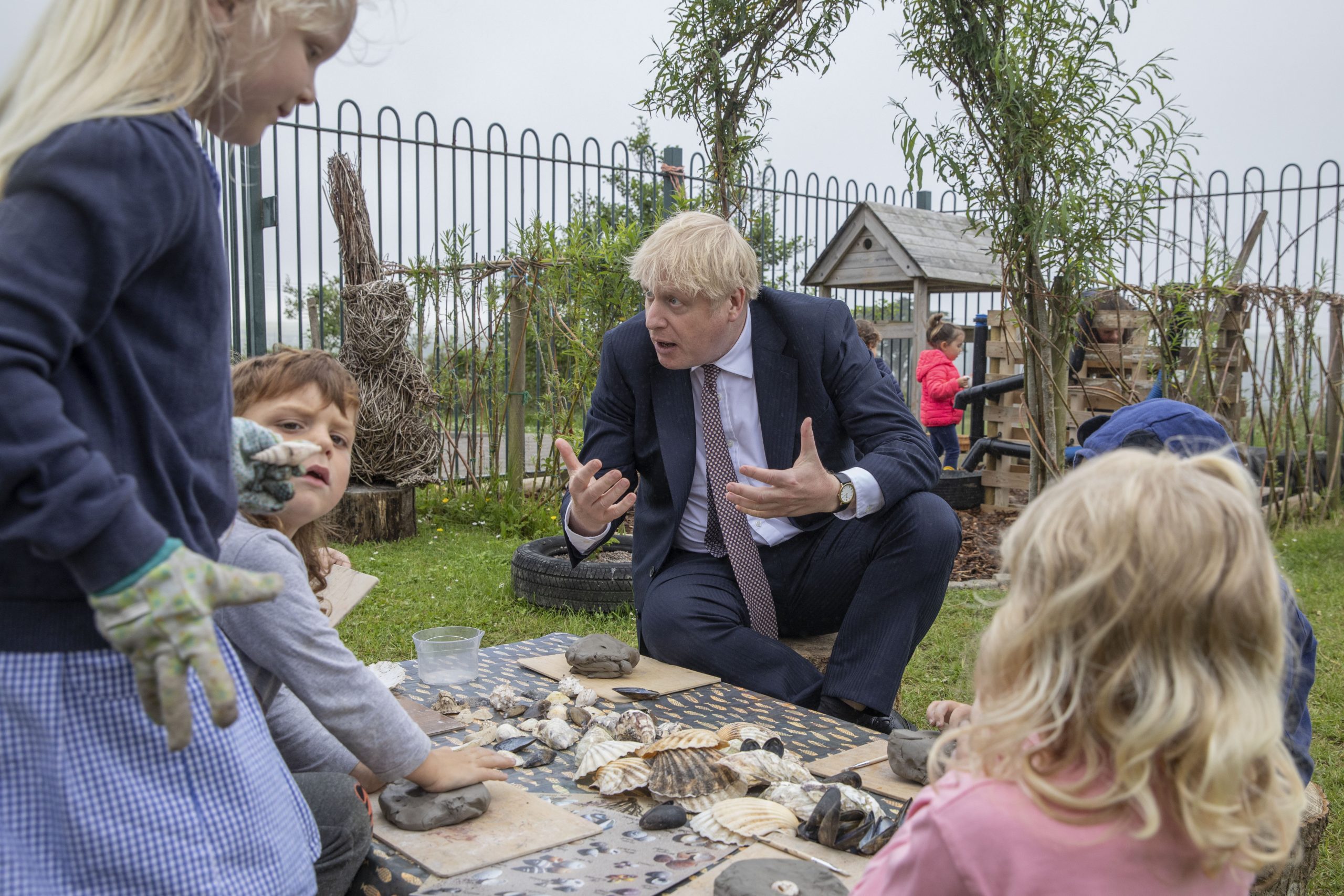 Prime Minister Boris Johnson talks with primary school children