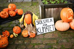 A Halloween pumpkin depicting climate activist Greta Thunberg at the Hebden Bridge Pumpkin Festival. Photo: Christopher Furlong/Getty Images.