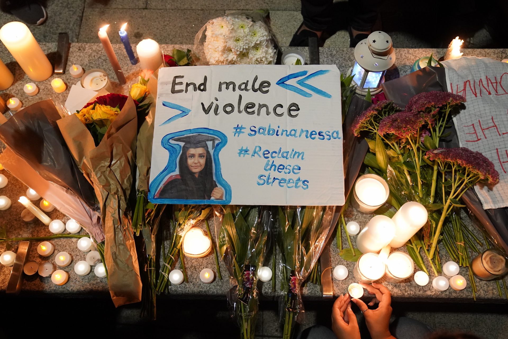 Members of the public attend a vigil in memory of Sabina Nessa, and in solidarity against violence against women, at Pegler Square in Kidbrooke, south London. Credit: Jonathan Brady/PA Wire/PA Images